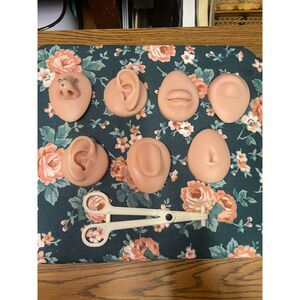 Set of 7 Silicone Piercing Display Models w/ Piercing Clamp – Used
